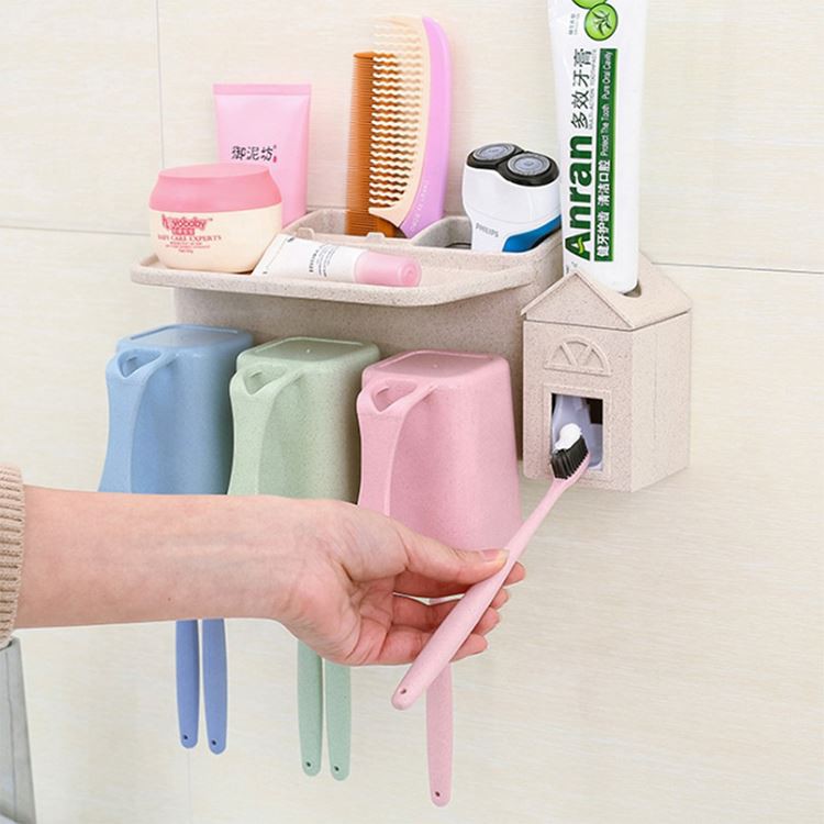 Dispensador de pasta de dents amb tasses