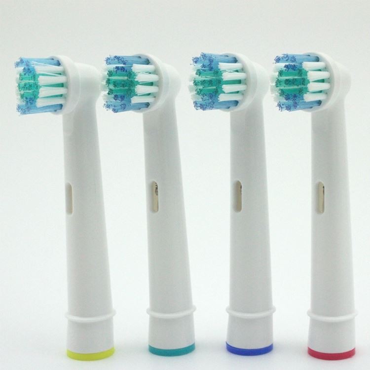Capçal de raspall de dents giratori